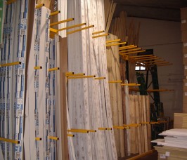 Vertical Storage Racks for PVCu Extrusions in a hand picking area Vertical Storage Racking with Divider Arms retaining PVCu profiles for self selection