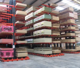 Stakapal High Bay Guided Aisle Cantilever Racking system Long loads of Panel Products accessed by specialist trucks with Cantilever Racking Guide Rail system
